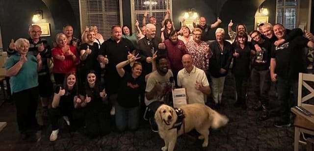 A charity quiz night gathering at The Overstone Arms